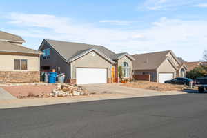 View of front of property with a garage