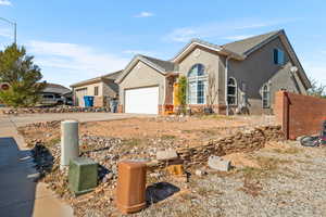 View of front of property with a garage