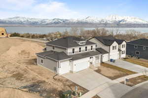 Bird's eye view featuring a water and mountain view