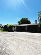 Exterior space featuring a carport