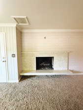 Interior details with carpet and crown molding