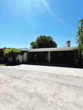 Exterior space featuring a carport