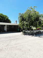 View of front of home featuring a carport