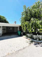 Exterior space with a carport