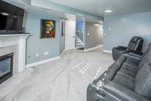 Fam room view 2 Colors are shades of gray. View towards stairs, hall to bdrm and bath