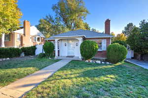 View of front of house with a front yard