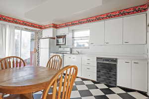 Dining space featuring sink