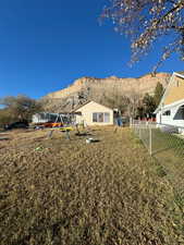 View of yard featuring a mountain view and a playground