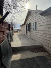 View of property exterior featuring a patio area