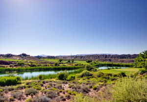 View of water feature featuring a mountain view of golf course