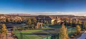 View of tennis and pickleball courts featuring a mountain view