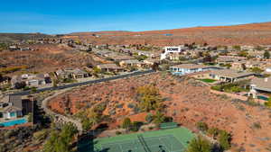 Birds eye view of property with a mountain view