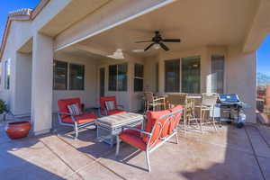 View of patio / terrace with grilling area and ceiling fan