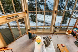 Sunroom with a baseboard radiator and a healthy amount of sunlight