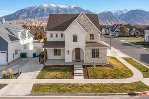 View of front facade with a mountain view and a porch