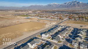 Birds eye view of property with a mountain view