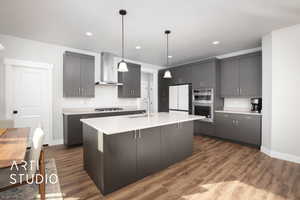 Kitchen featuring wall chimney exhaust hood, white fridge, dark hardwood / wood-style flooring, and sink