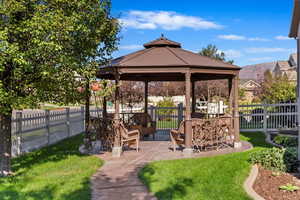 View of home's community featuring a gazebo and a mountain view