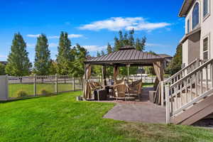 View of yard featuring a gazebo and a patio area