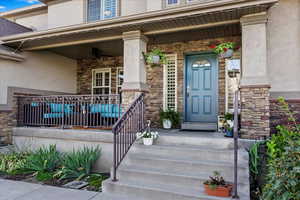 Entrance to property with a porch