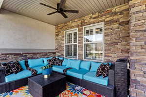 View of patio featuring ceiling fan and an outdoor hangout area