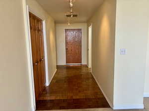 Hall with dark parquet floors