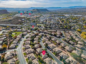 Birds eye view of property featuring a mountain view