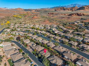 Birds eye view of property with a mountain view