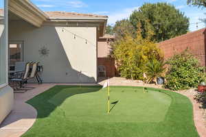 View of yard with a patio area