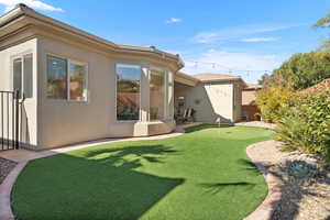 Rear view of house with a patio