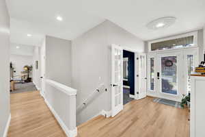 Foyer featuring light wood-type flooring