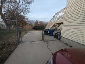 View of patio / terrace featuring central AC and a mountain view