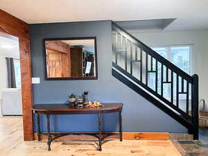 Stairway with hardwood floors