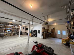 Garage featuring a garage door opener