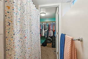 Spacious closet featuring carpet