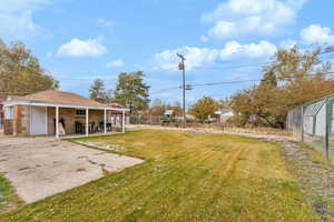 View of yard with a patio