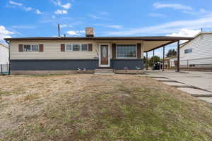 View of front of home with a front lawn