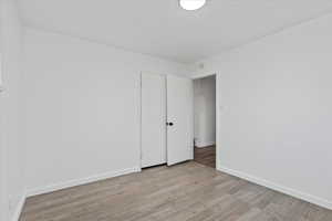 Unfurnished room featuring light hardwood / wood-style floors