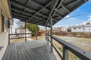 Deck featuring a storage shed