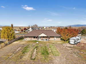 Birds eye view of property with a mountain view