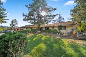 View of front of house with a front lawn