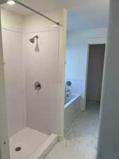 Bathroom with plus walk in shower