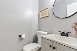 Bathroom with vanity and toilet