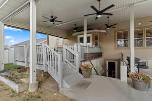 View of patio / terrace with ceiling fan and area for grilling