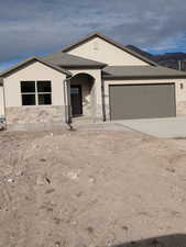 View of front facade with a garage