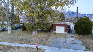 View of front of home featuring garage