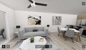 Living room featuring ceiling fan and light wood-type flooring