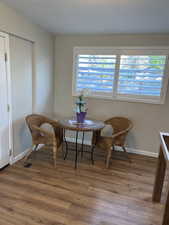 Living area featuring wood-type flooring