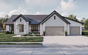 Modern farmhouse with a garage and a front lawn