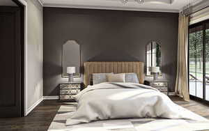 Bedroom featuring ornamental molding, access to outside, and dark wood-type flooring